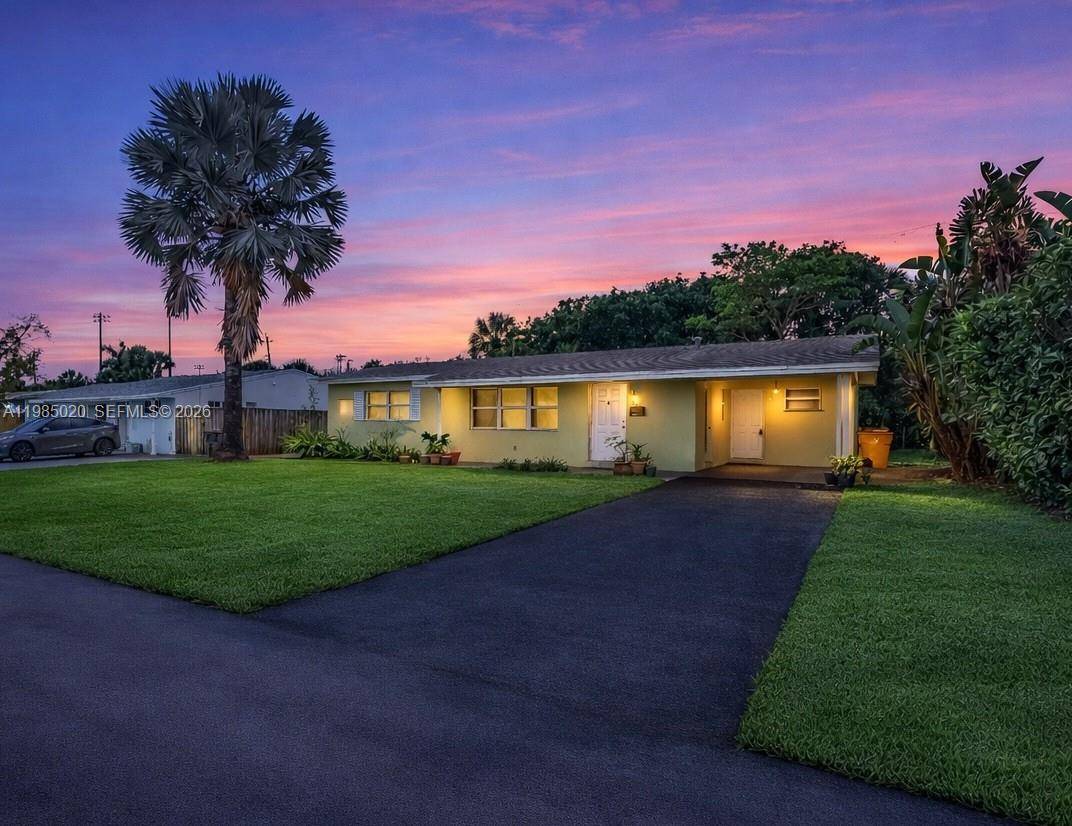 Bike to the beach and enjoy waterfront dining at The Cove Waterfront Restaurant from this well located home in Deerfield Beach.