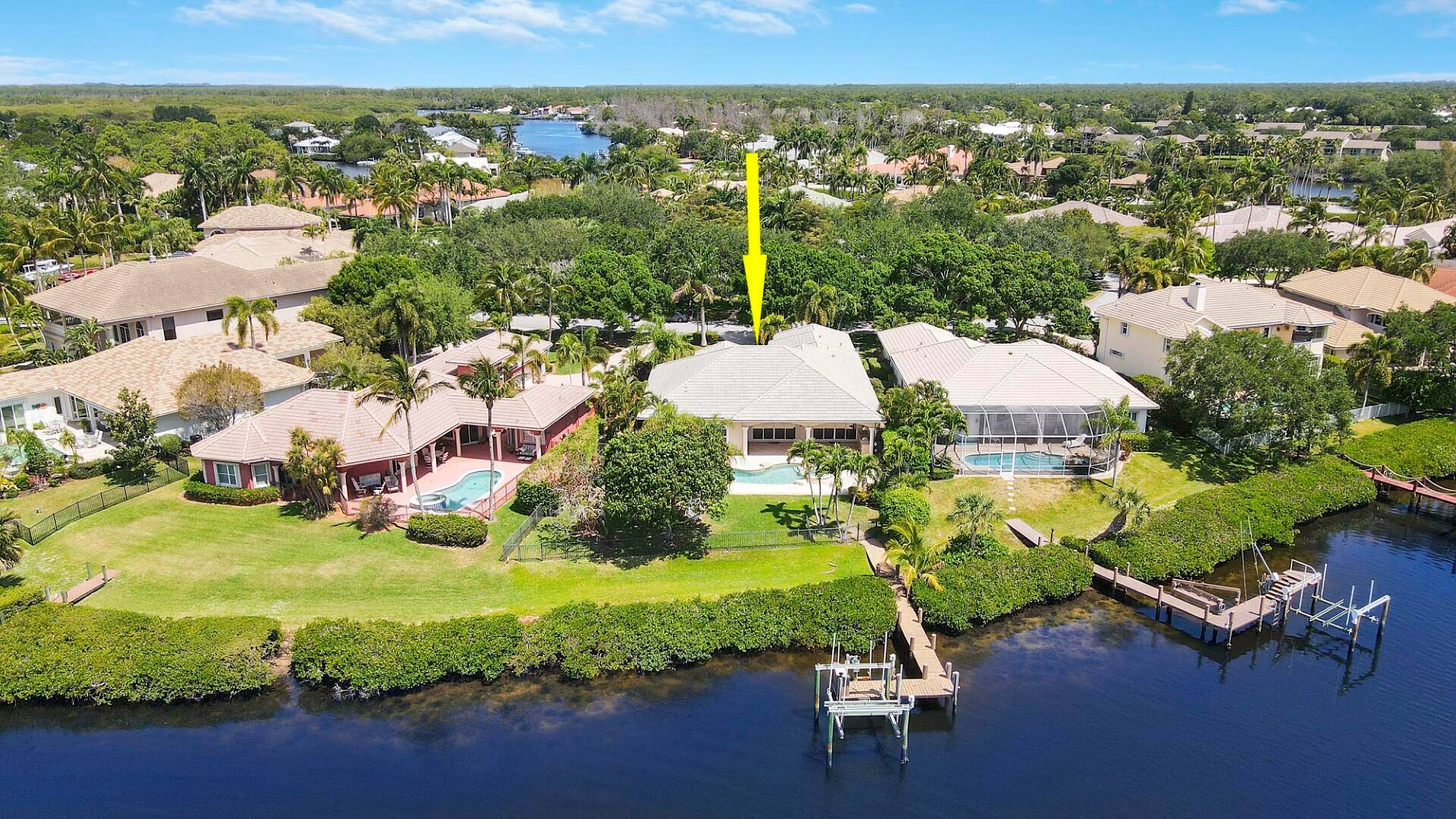 Enjoy the epitome of waterfront living in this spacious Loxahatchee riverfront home.