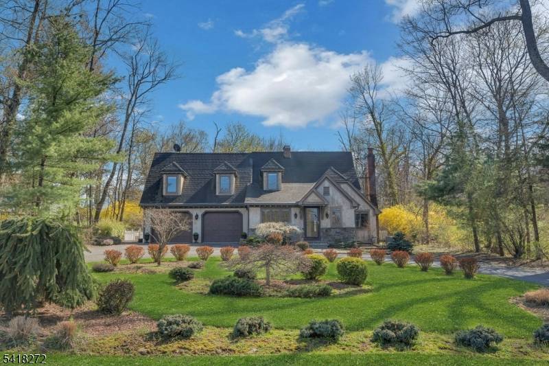 Welcome to 21 Hewlett Road, a beautifully maintained custom Tudor nestled on a quiet dead end street in highly sought after Montville, with its top rated schools.