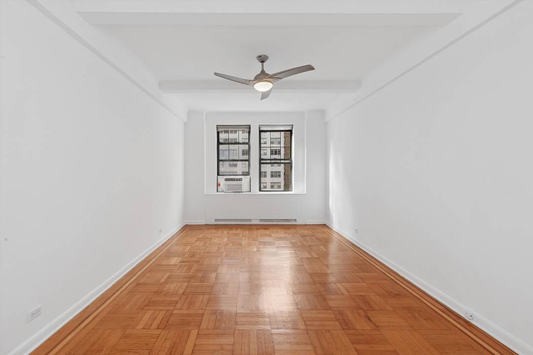 Some photos have been virtually staged Welcome to Apartment 704, a prewar studio with high ceilings and southern exposure in a luxury coop just minutes from Central Park.