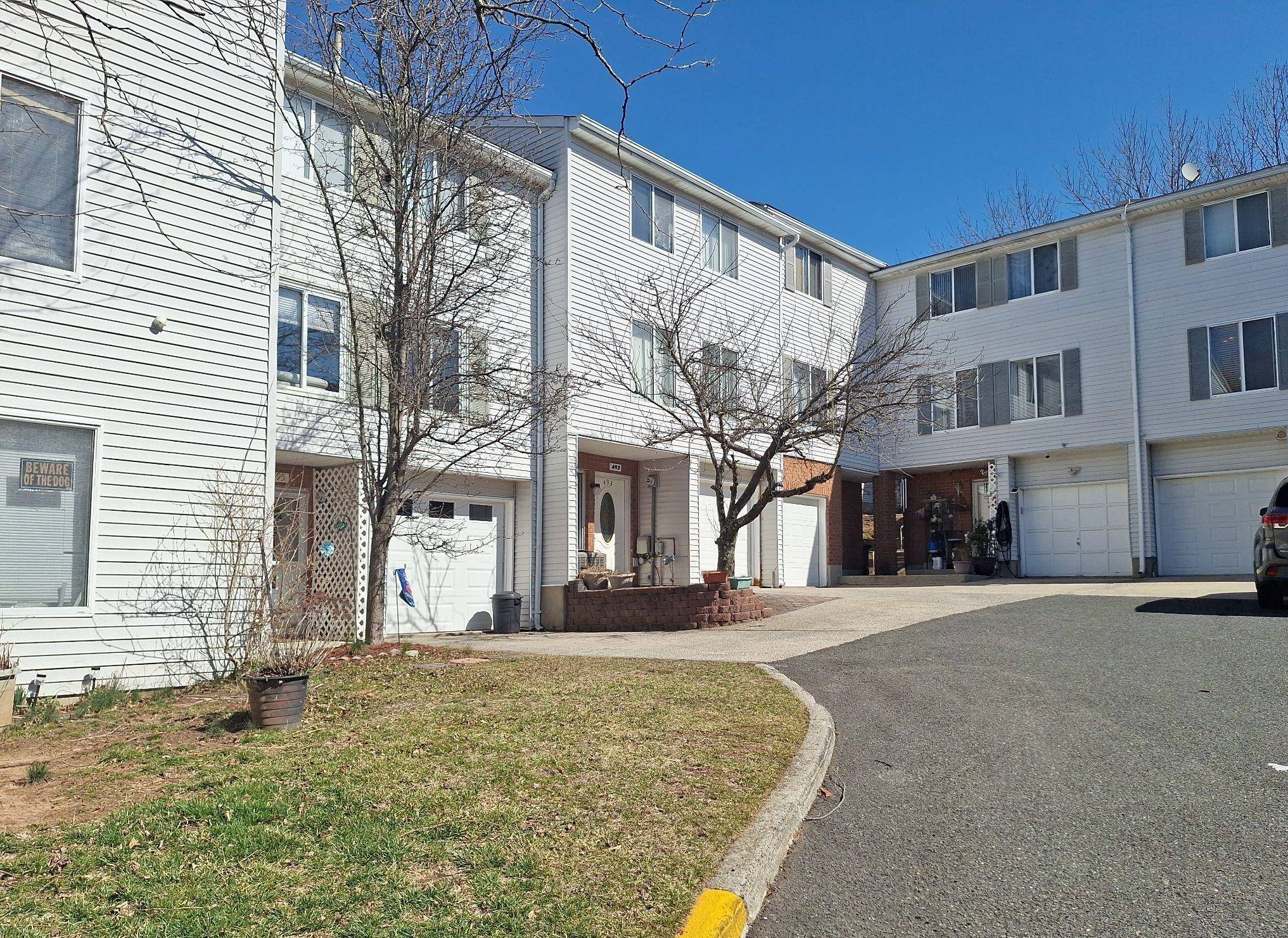 This Townhouse Style Home Features 3 Bedrooms, 2 Full Baths, 2 1 2 Baths, Formal Dining Room, amp ; 1 Car Garage.