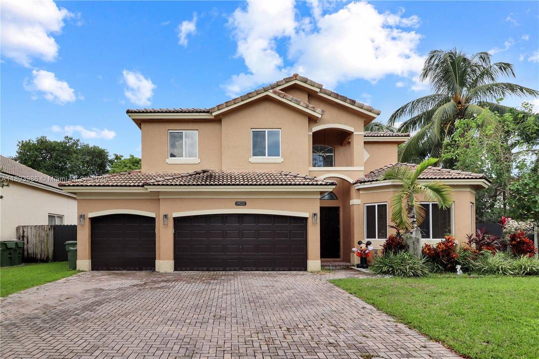 Welcome to this turnkey two story home located in the luxurious Palm Isles Estates.