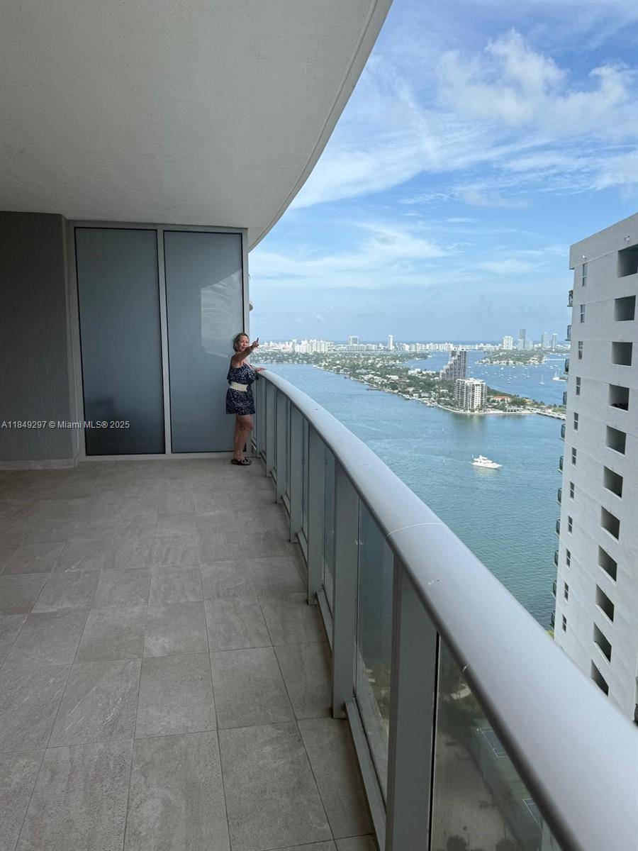 Welcome to luxury living on the 32nd floor of the coveted Aria on the Bay.