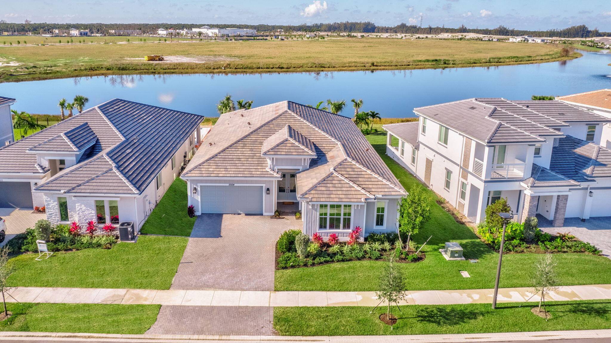 This stylish home combines chic modern design with breathtaking water views, offering a serene retreat both inside and out.