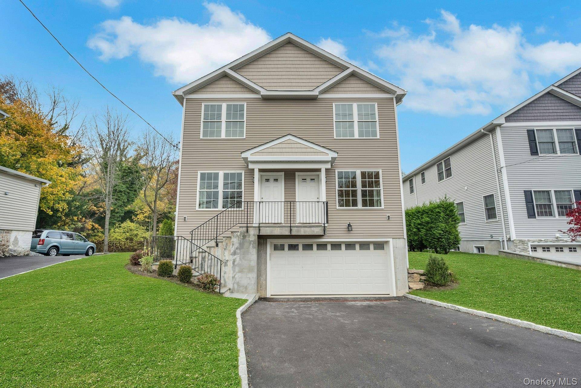 Discover an exceptional opportunity with this newly built 2 family home perfectly positioned in the heart of Mamaroneck.