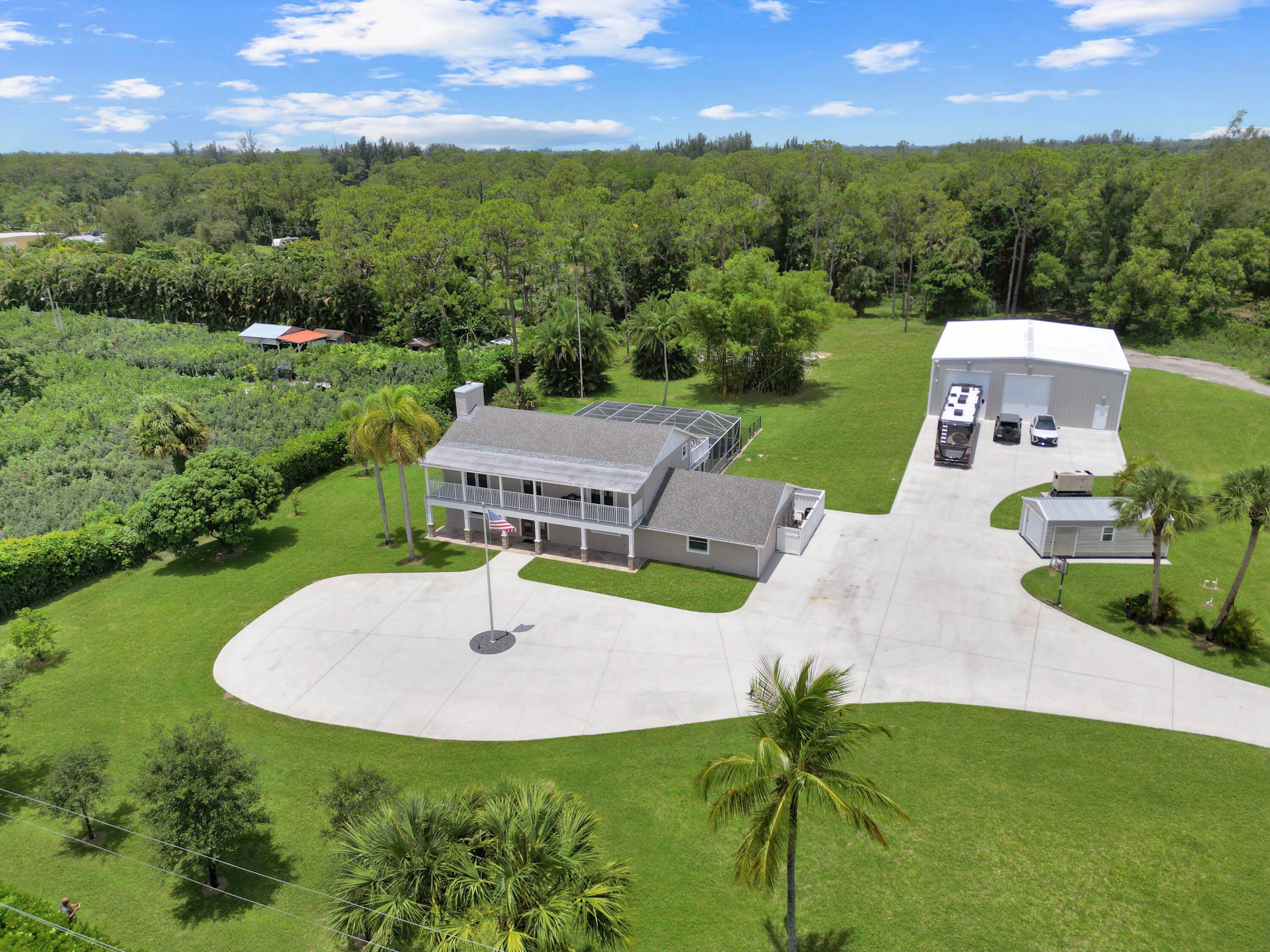 Owner financing available at below market interest rate available on your private 5 acre paradise in Loxahatchee Groves !