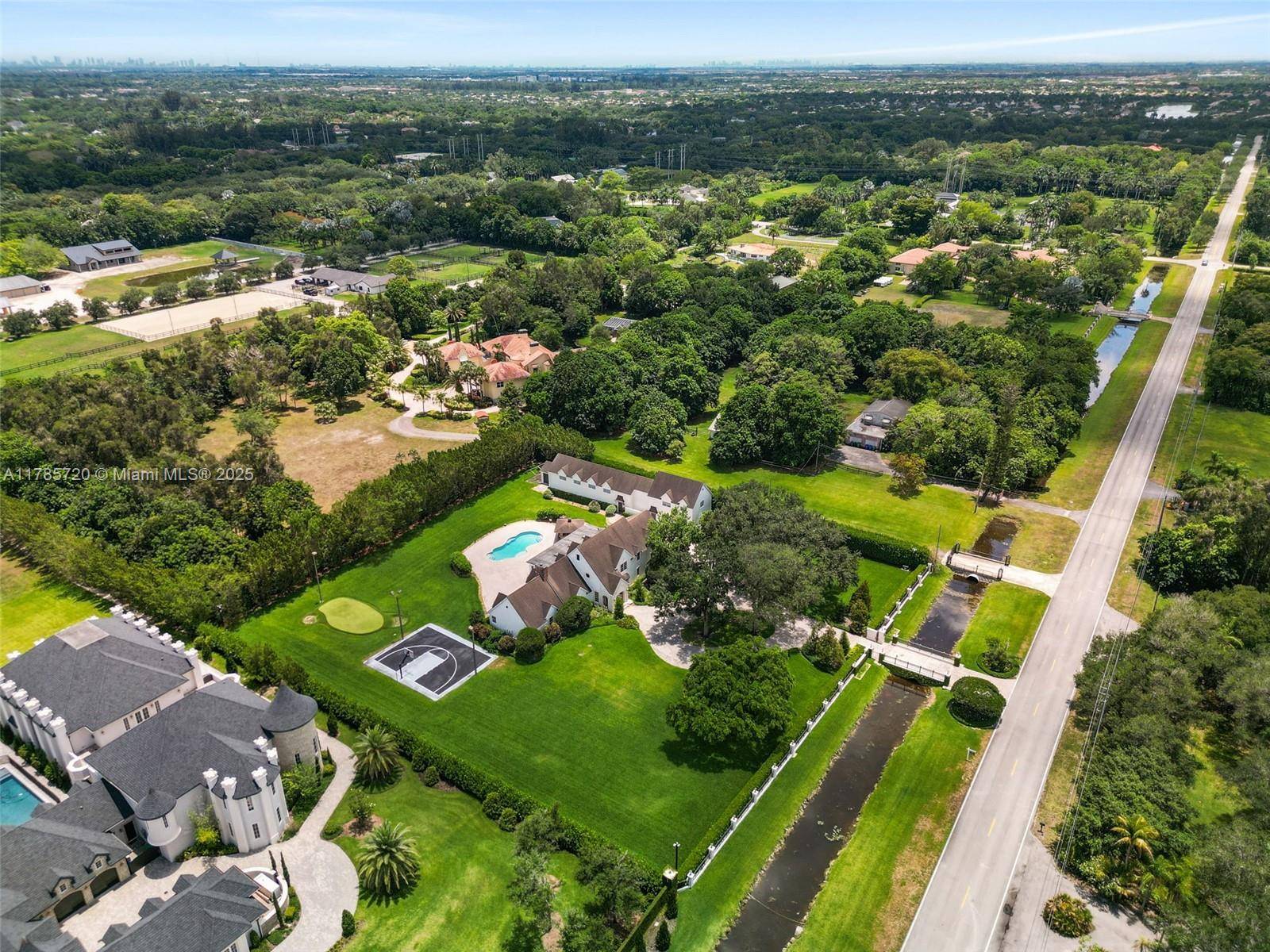 Live like royalty in Southwest Ranches at this exquisite equestrian estate located on the prestigious Hancock Road, known as one of the most coveted addresses in South Florida.