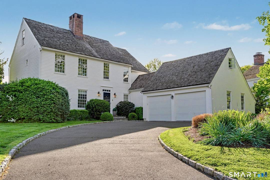 Enjoy a vacation at home lifestyle year round in this beautifully renovated and expanded home, located within the private Dolphin Cove association.
