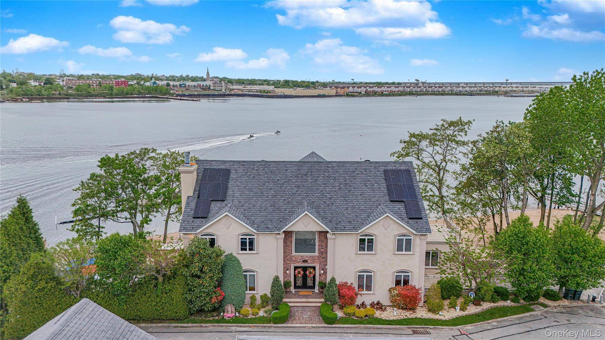 Exceptional Waterfront Estate with Private Dock Just 40 Minutes to Manhattan by Boat.