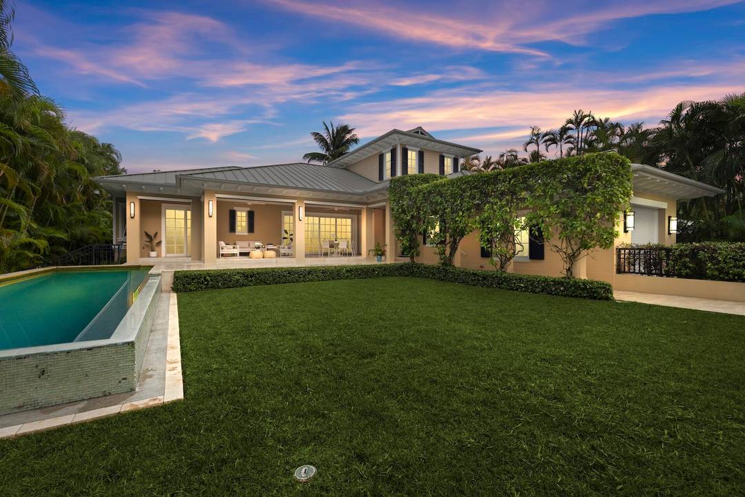 This Bermuda inspired custom residence, built in 2014, blends classic architectural charm with modern sophistication.