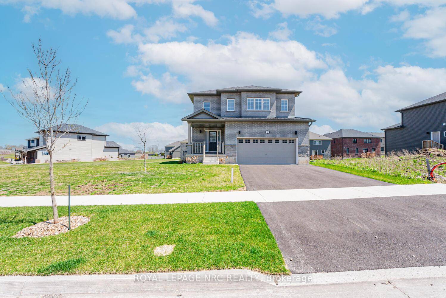 FOR LEASE. Gorgeous never before lived in 4 bedroom, 4 bath home in fantastic north end Port Colborne location.