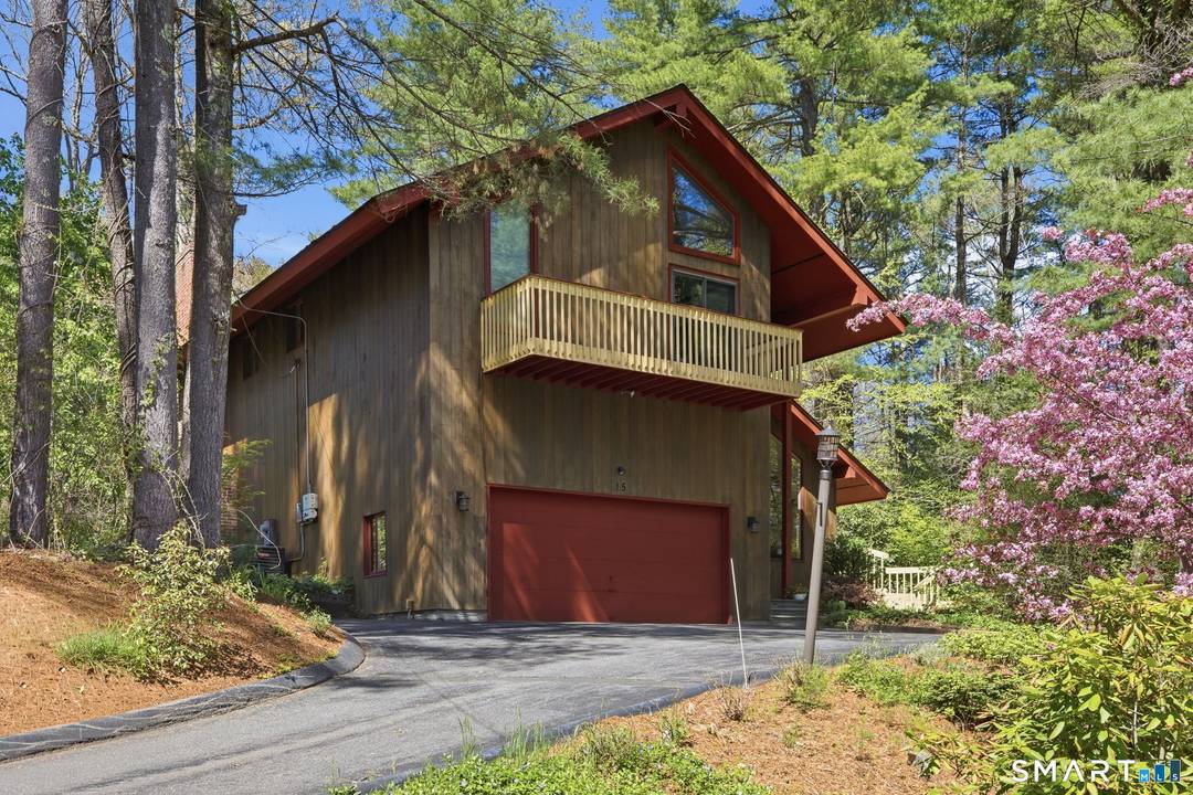 Tucked away on a private, lightly wooded lot in one of Glastonbury's most sought after school districts, this contemporary home offers the perfect balance of warmth, space, and modern comfort.