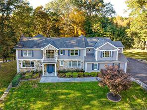 Like new renovation in 2007, this five bedroom Colonial with entertaining deck graces one acre on a cul de sac near Stamford shops, schools and Merritt.