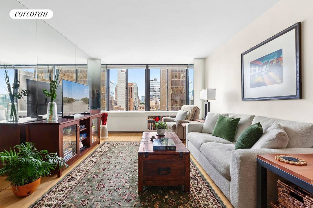 Welcome to Residence 27 28B at 445 Fifth Avenue a rare duplex 1 bedroom, 2 bathroom home offering a thoughtfully designed living space in the heart of Midtown.