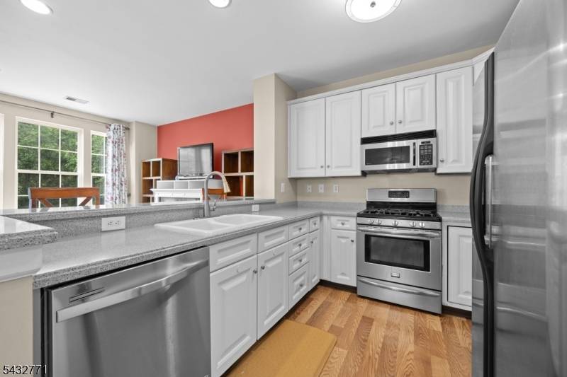 Bright, spacious and ideally located townhouse, just minutes from NYC transportation, major highways, shopping, schools, and local restaurants.
