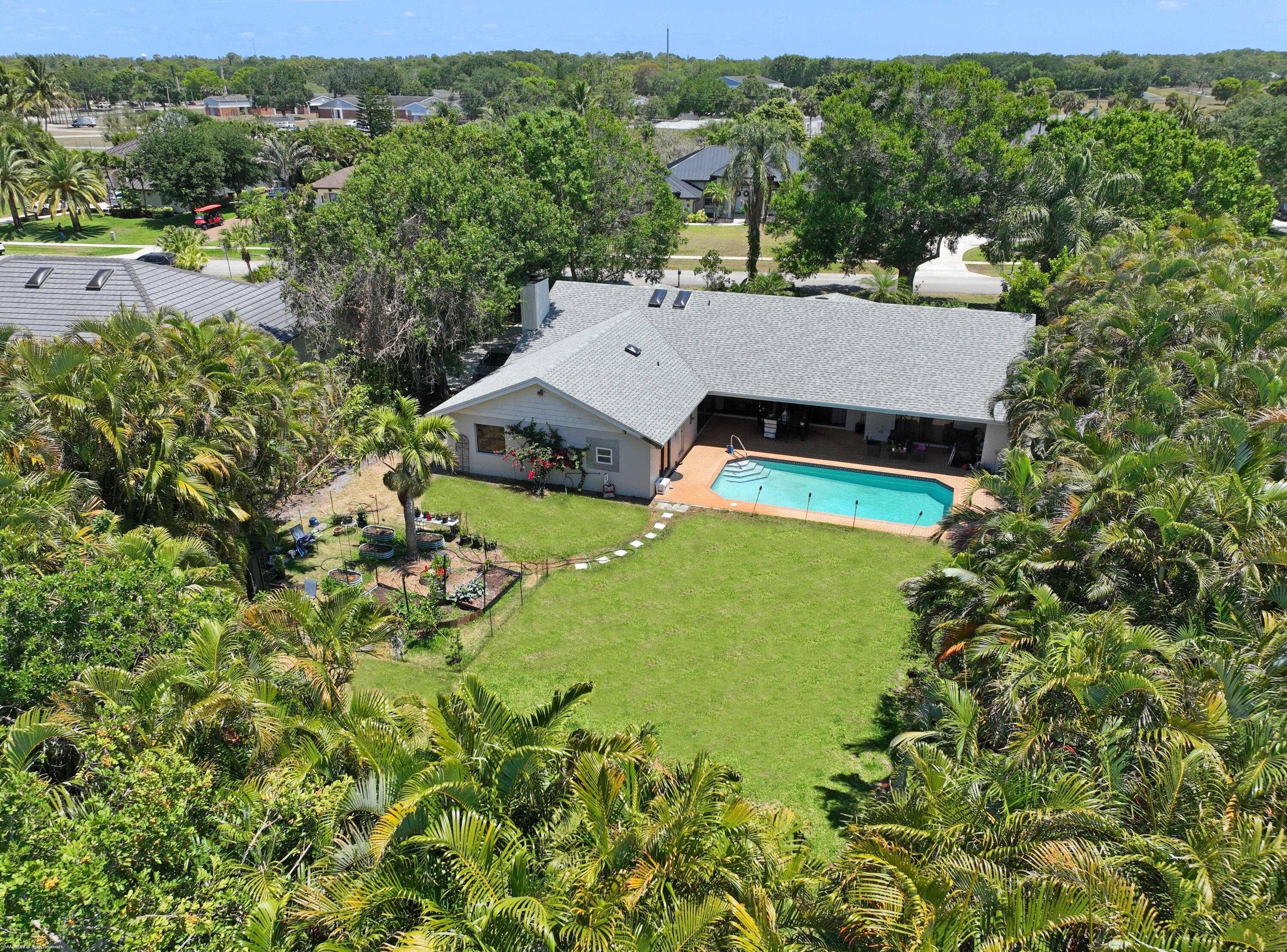 This single family pool home is nestled on a lush and tropical half acre lot in the highly sought after community of Meadow Wood and boasts a brand NEW ROOF ...