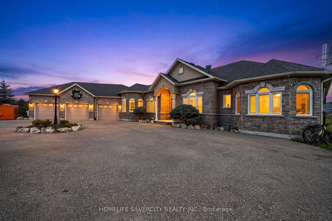 Beautiful custom built Bungalow Raised on a stunning 6 acre treed rolling lot in sought after Caledon.