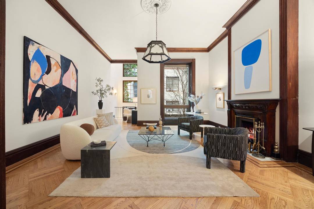 Iconic Queen Anne Townhouse on a Prime Central Park Block with Grand Ceilings, Timeless Charm, and Romantic DetailsNestled on a prime Central Park block in the Upper West Side, 51 ...