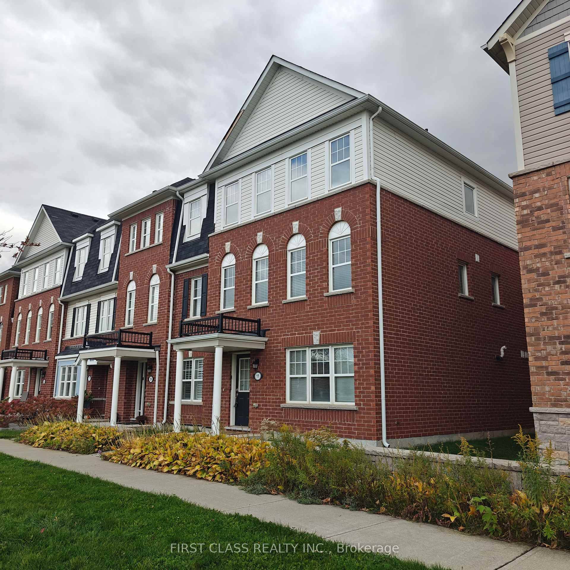 Beautiful 4 Bedroom End Unit Townhome with Double Car Garage !