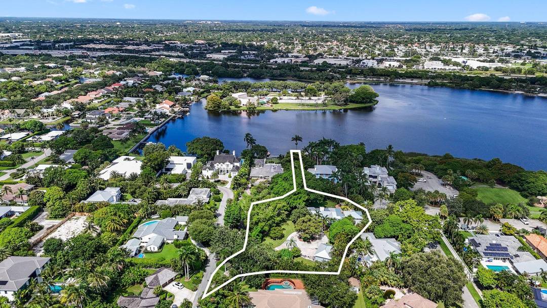 Discover unparalleled privacy and comfort in this Key West Style home nestled in the prestigious Lake Ida neighborhood of Delray Beach.