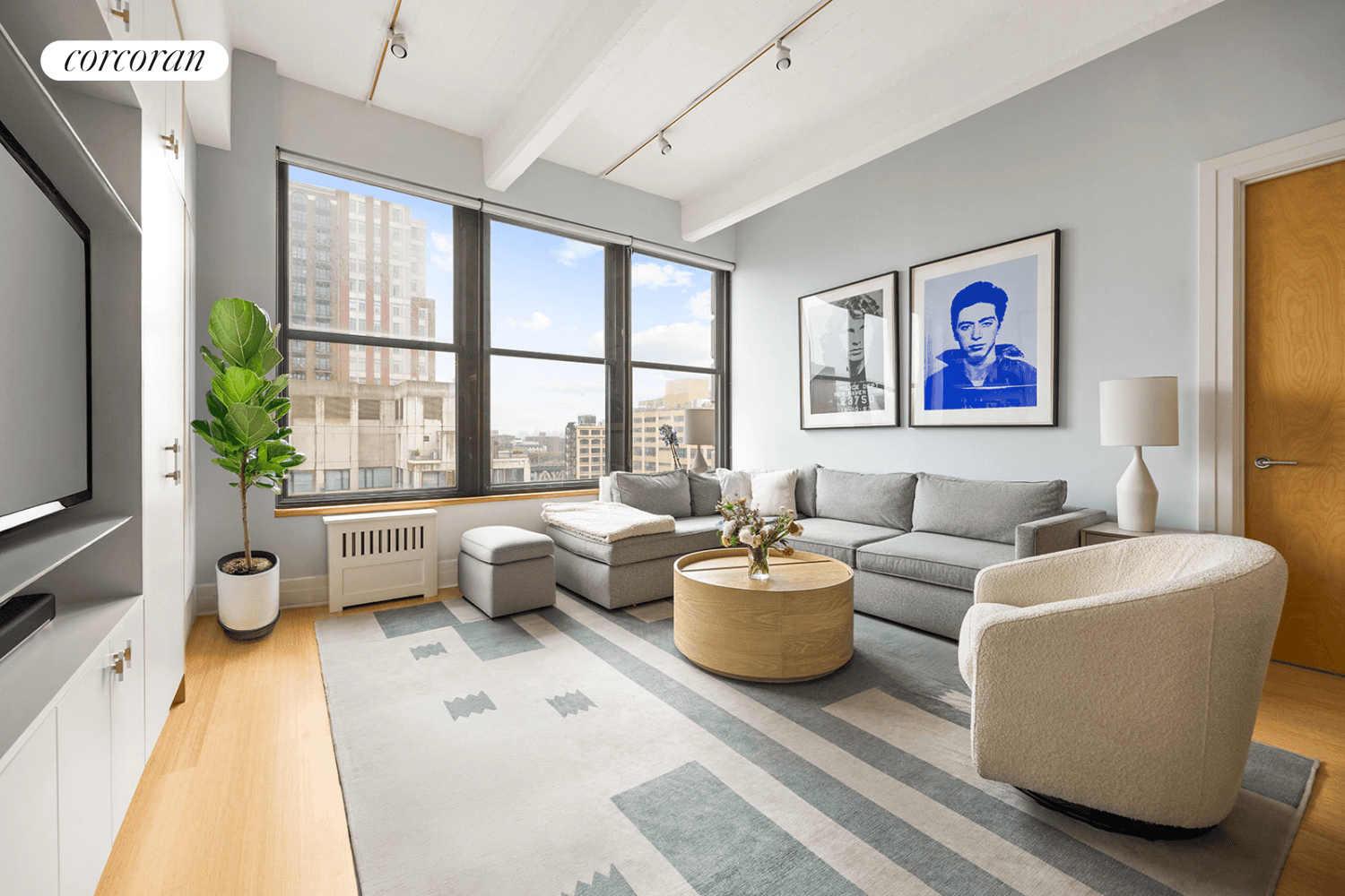 You will feel at home right away in this bright and airy loft in Dumbo's most desirable condo.