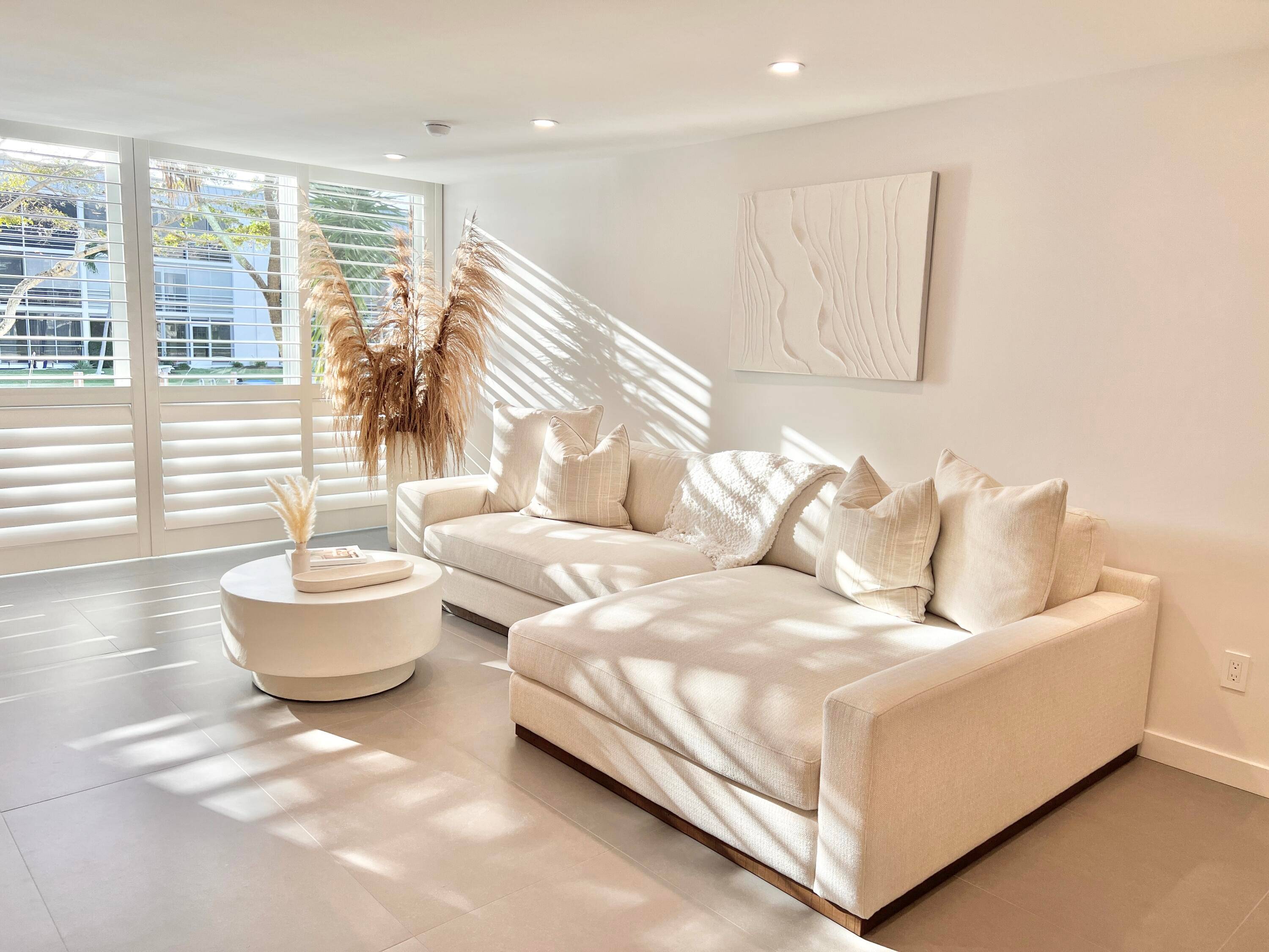 Welcome to modern coastal living in East Boca.