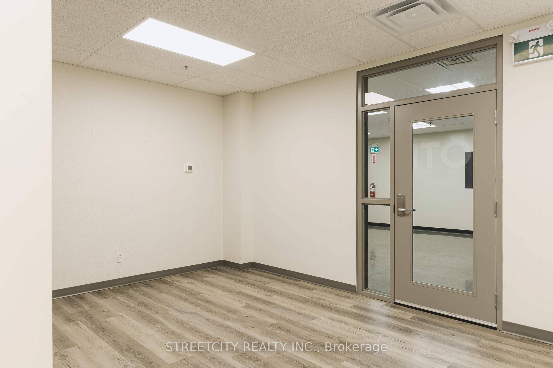 Fully built out office space with several workspaces, many private offices a board room and lunchroom with kitchenette.