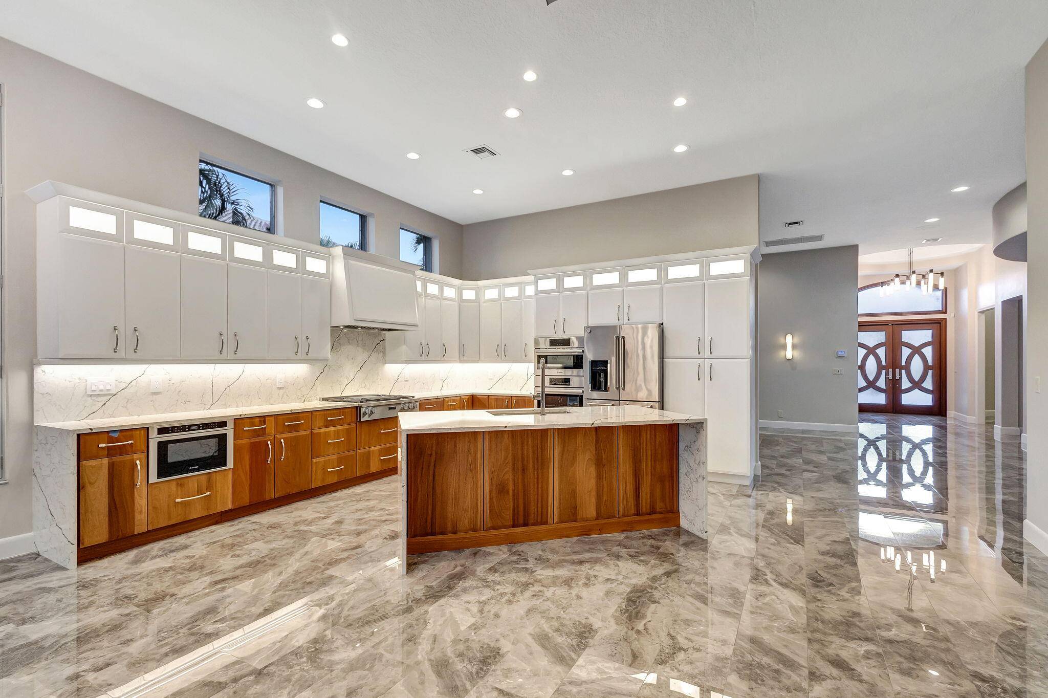 Step into a world of elegance and sophistication in this beautifully renovated home, in Mirasol Country Club in Palm Beach Gardens.