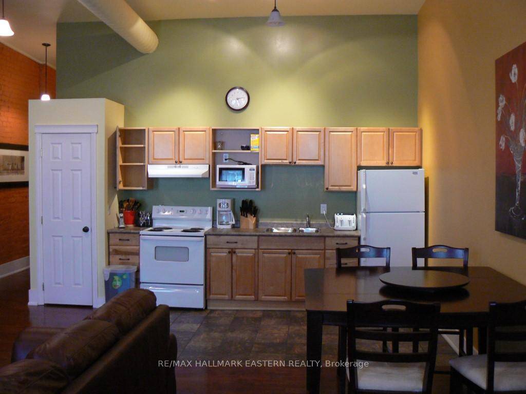 Executive 2 brm downtown loft style apartment suite, includes utilities, free laundry, furnishings if desired.