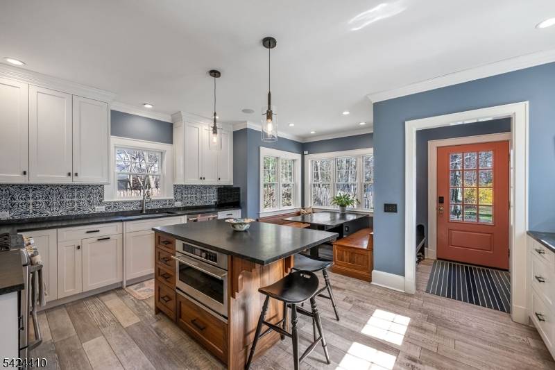 Masterfully uniting 1920s grandeur with modern luxury, 20 Georgian Road is a breathtaking 5 bed, 3 Full 2 Half bath Colonial in Morristown's prestigious Washington's Headquarters.
