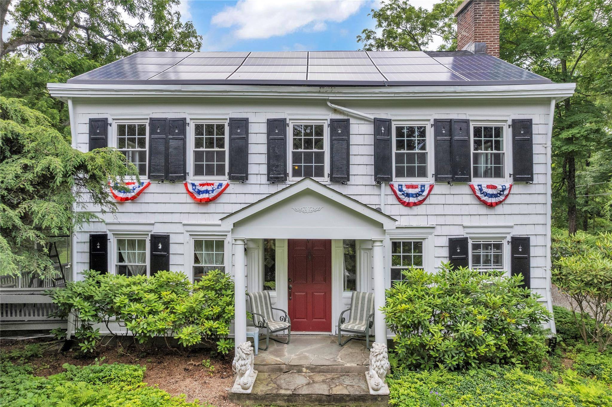 Travel back in time with this enchanting historical home that effortlessly combines old world charm in a bucolic neighborhood nestled next to a castle.