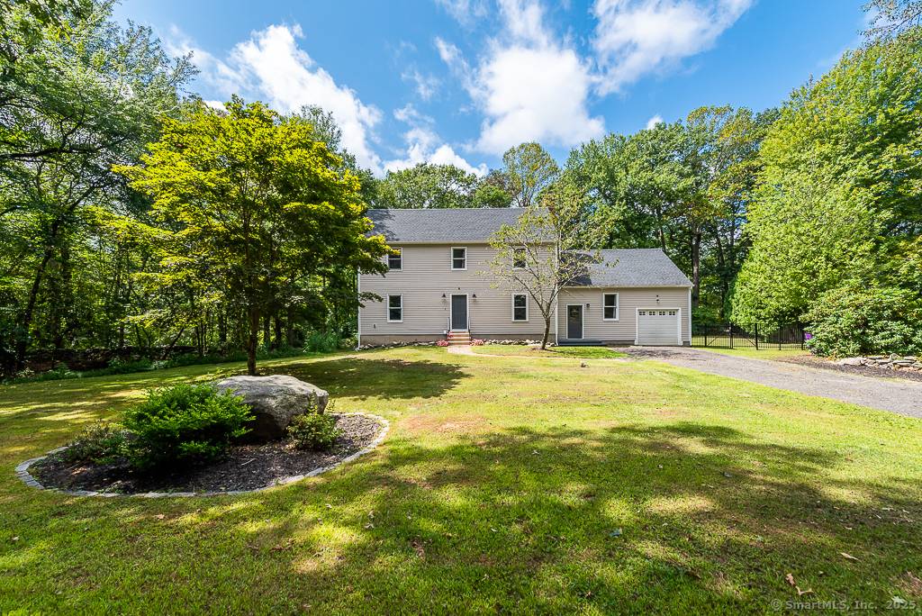 This beautiful Saltbox style home is a dream retreat, nestled in a quiet subdivision in the sought after town of Killingworth.