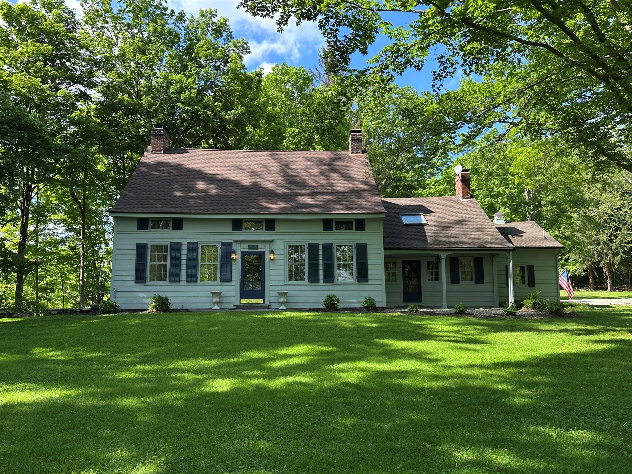 This historic home was originally built in Millbrook, New York in 1733 by one of the nine partners of the early English land grant.
