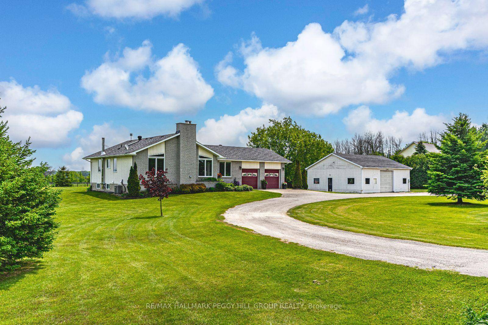 TWO ACRES, TWO GARAGES, AND ONE UPGRADED BUNGALOW YOUR NEXT MOVE STARTS HERE !