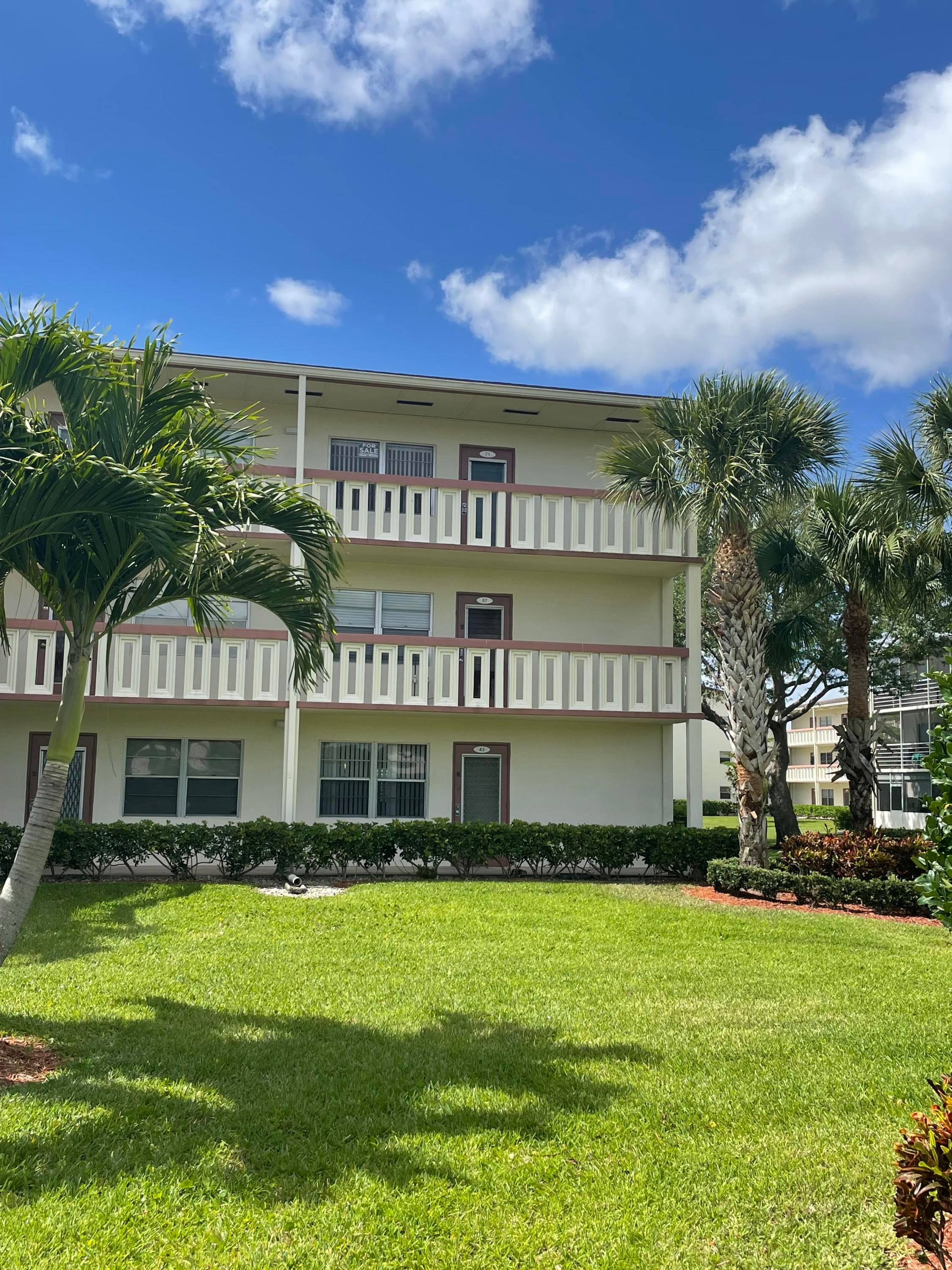 Welcome to this sun drenched top floor corner unit in the desirable 55 community of Century Village of Boca Raton.