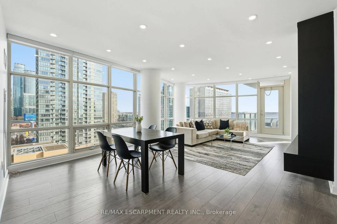 Stunning, recently renovated 2 1 bedroom, 2 bath condo in the heart of downtown Toronto.