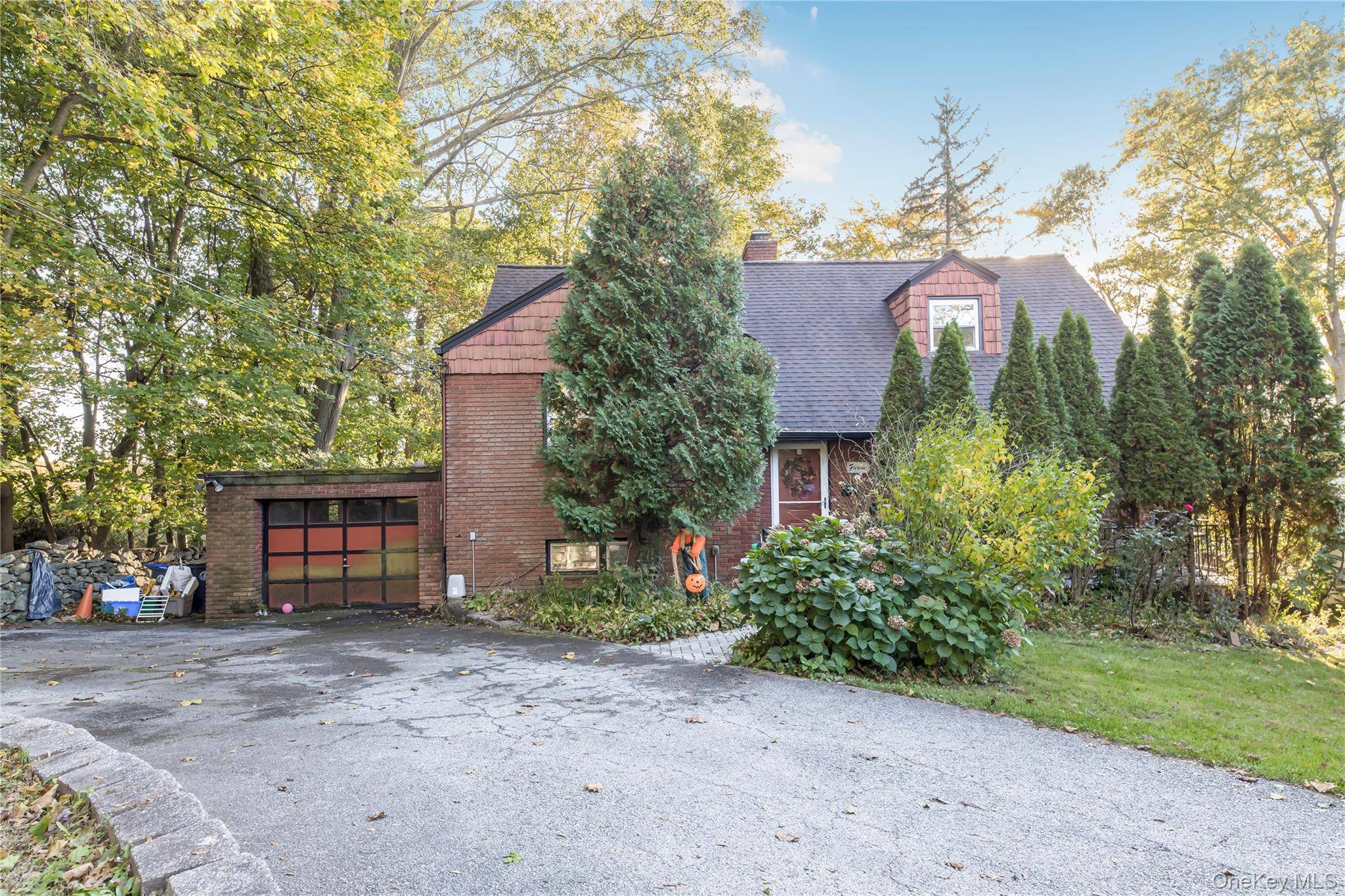 Tucked away at the end of a peaceful dead end street, this unique split level home offers privacy and potential no future neighbors can build beside you !