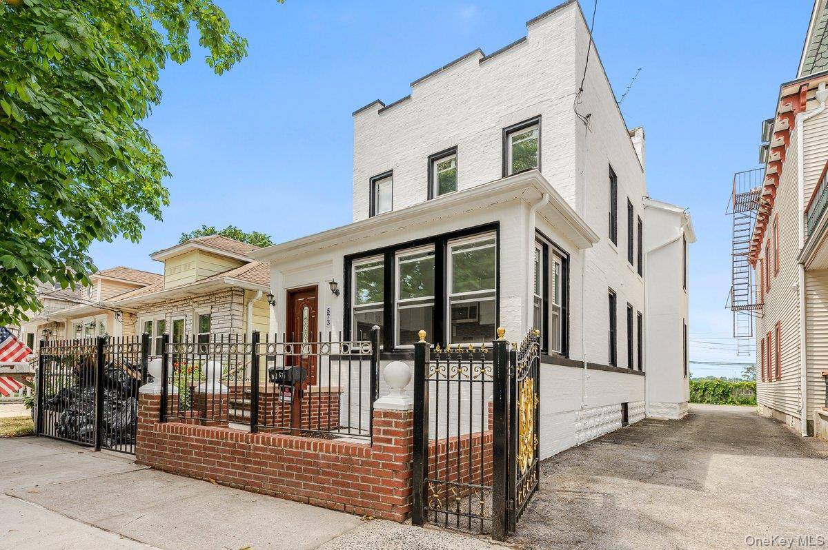 Step into turn key luxury with this fully renovated, detached multi family brick home nestled in the charming City Island neighborhood of the Bronx.