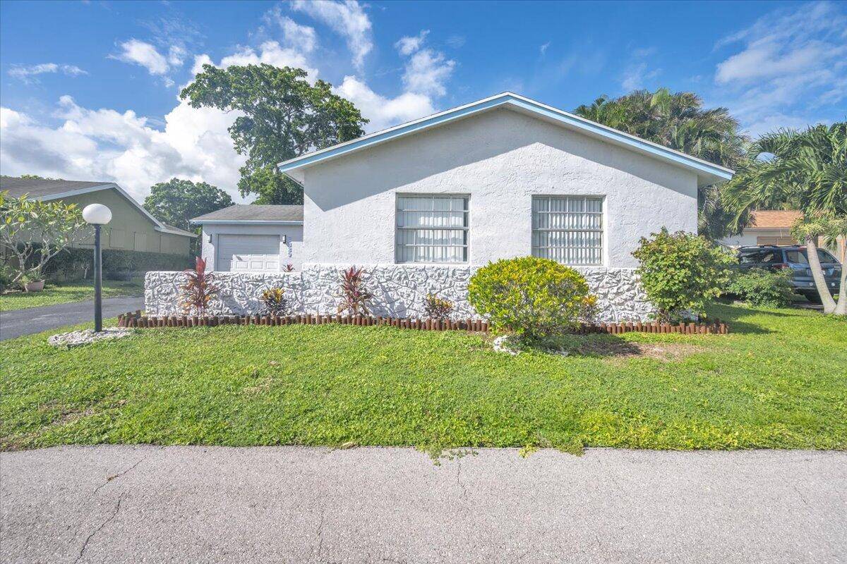 Nestled in the low HOA 55 community, this beautifully maintained 1, 325 sq.
