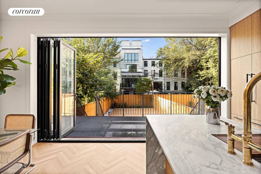 Enjoy a historic brick home with true curb appeal that seamlessly blends the best of the old and new, both inside and out.