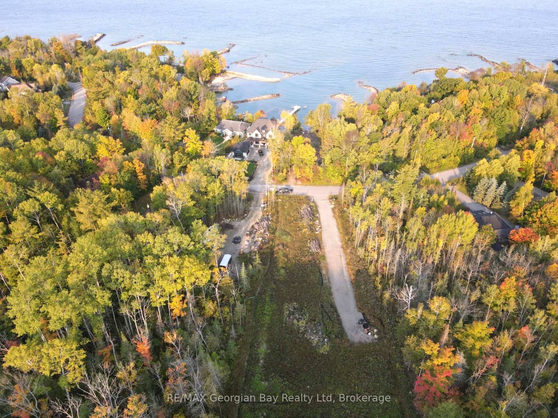 Lot is cleared ! Lovely building lot in Prestigious area of Thunder Beach, ready to be built on now.