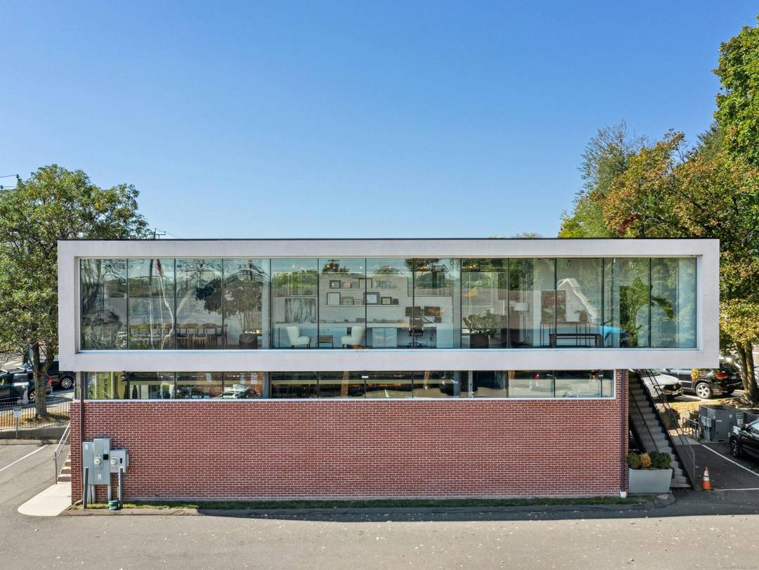 Elevate your business in one of New Canaan's most iconic and visible locations, directly across the street from the Metro North Train Station and only 300 feet from the heart ...
