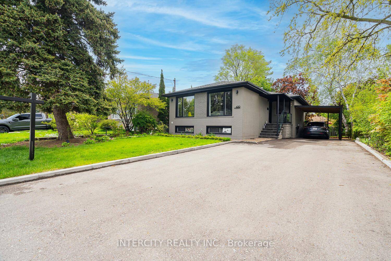 Welcome to 420 Wenlock Ave A sleek, fully renovated bungalow in one of Richmond Hills most desirable neighborhoods.