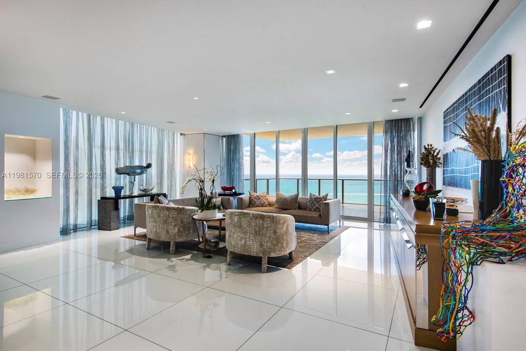 First time ever offered. Experience unparalleled ultra luxury in this meticulously crafted direct oceanfront corner residence at the iconic St.