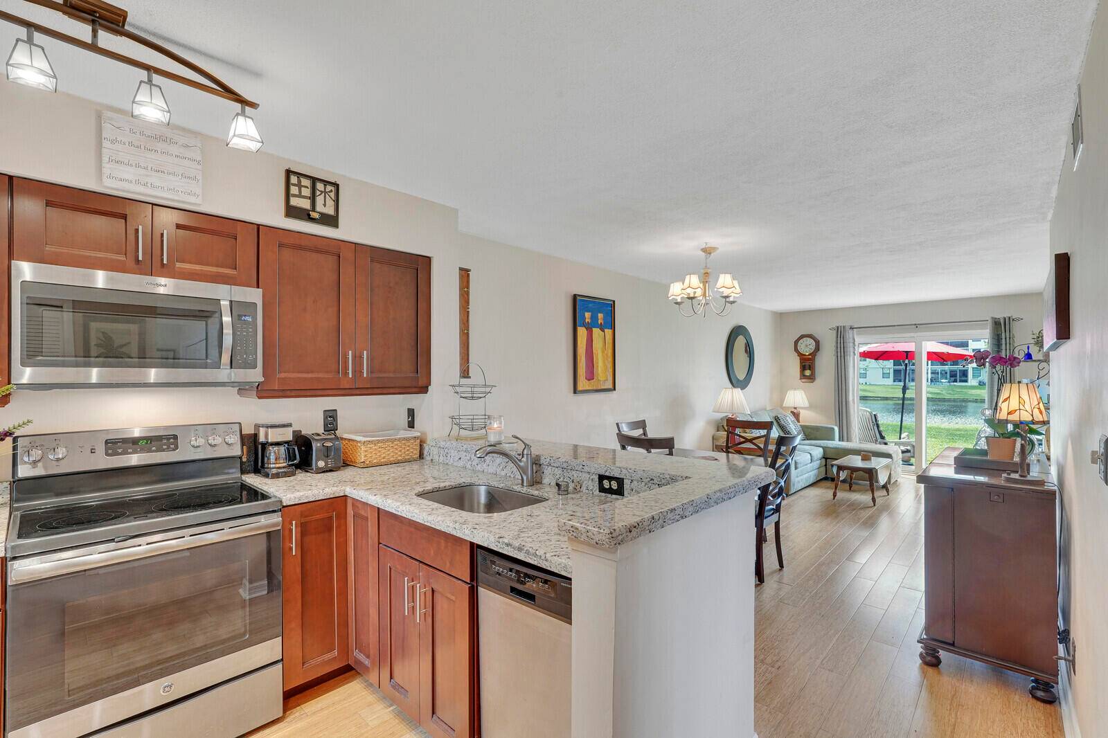 Rarely available 2 bedroom 2 full bath end unit on the ground floor of Cypress Bend IV.