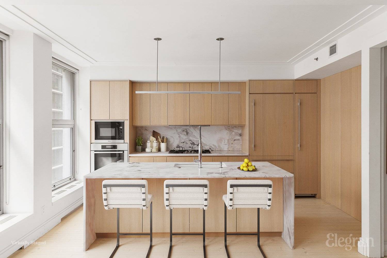 Located in the vibrant Flatiron district, this exquisitely redesigned duplex spans the entire eighth and ninth floors of the boutique condominium at 16W21.