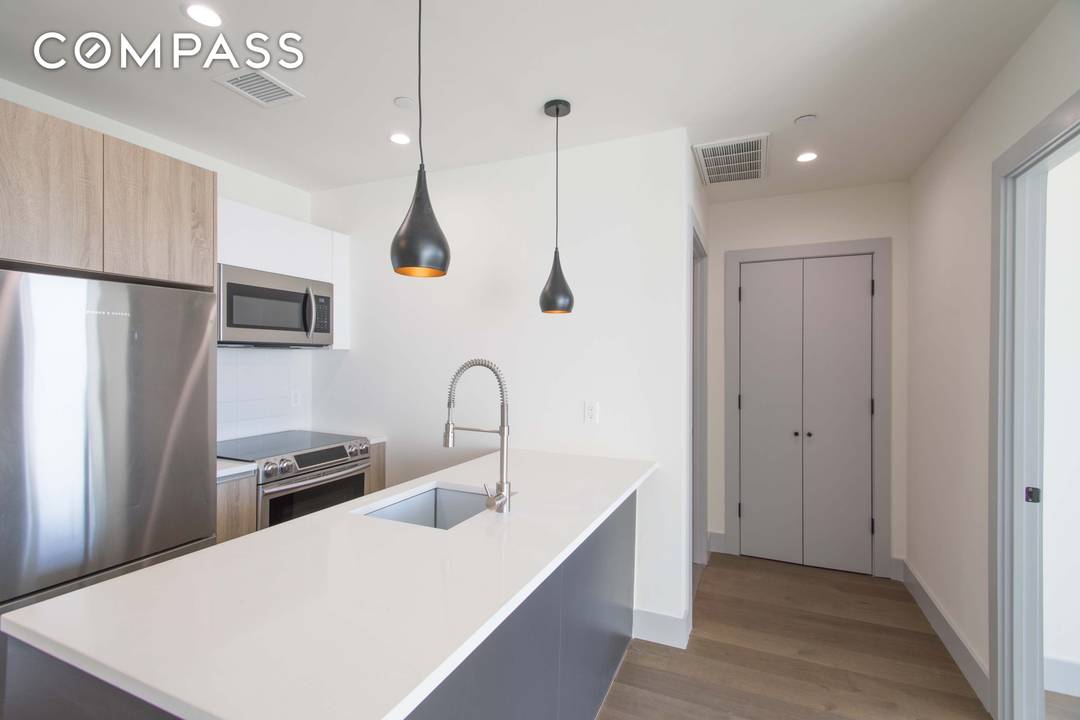 Beautifully renovated 2 bedroom condo featuring an open concept layout with floor to ceiling windows and sunny southern exposure.