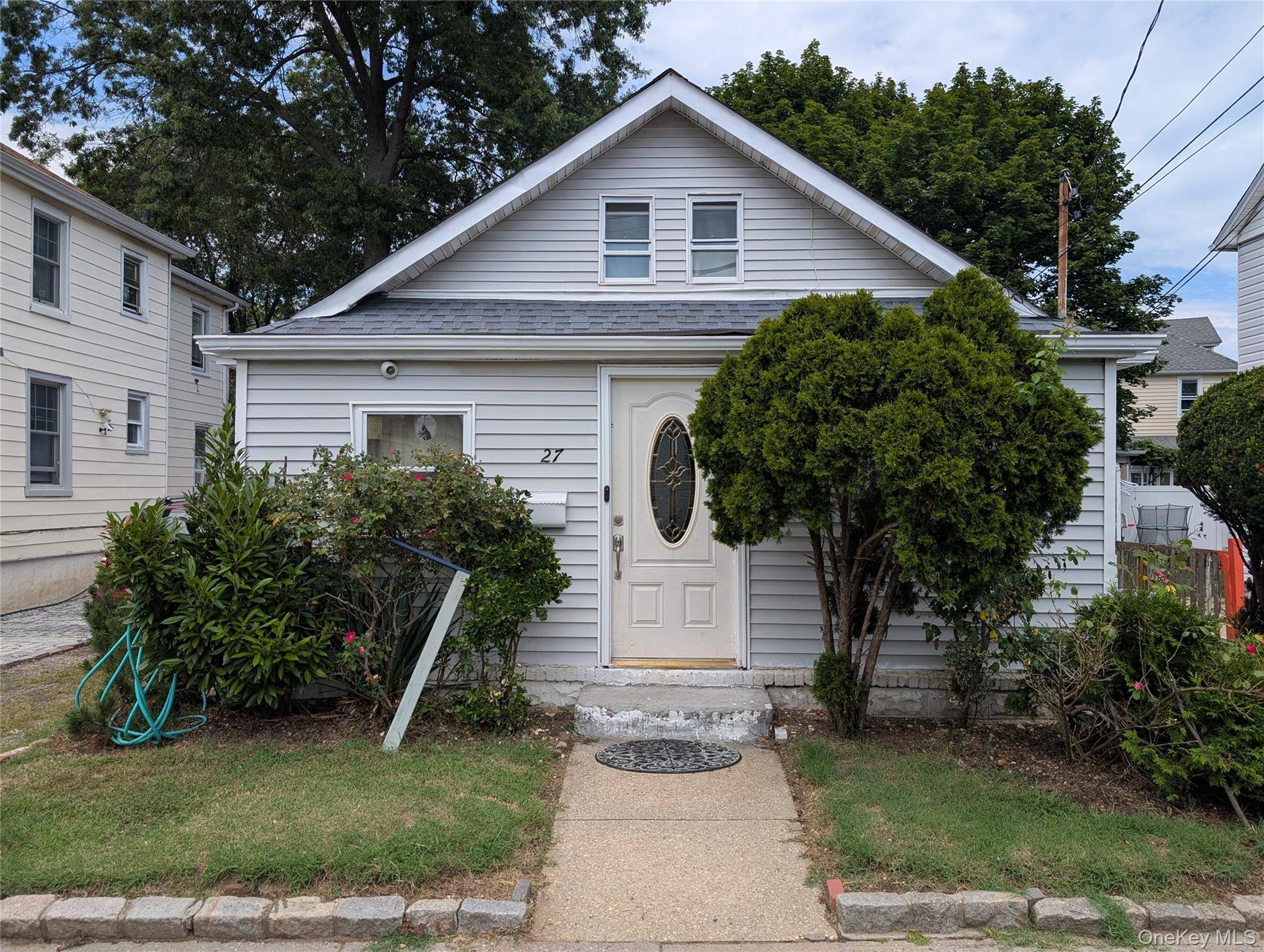 Charming 3 bedrooms amp ; 2 baths bungalow in need of some TLC.