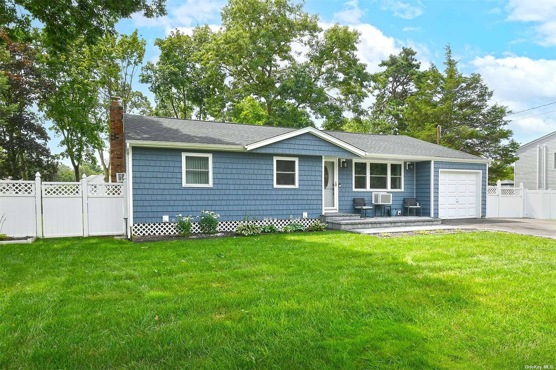 Welcome To This Charming Ranch, Updated Throughout With Hardwood Floors.