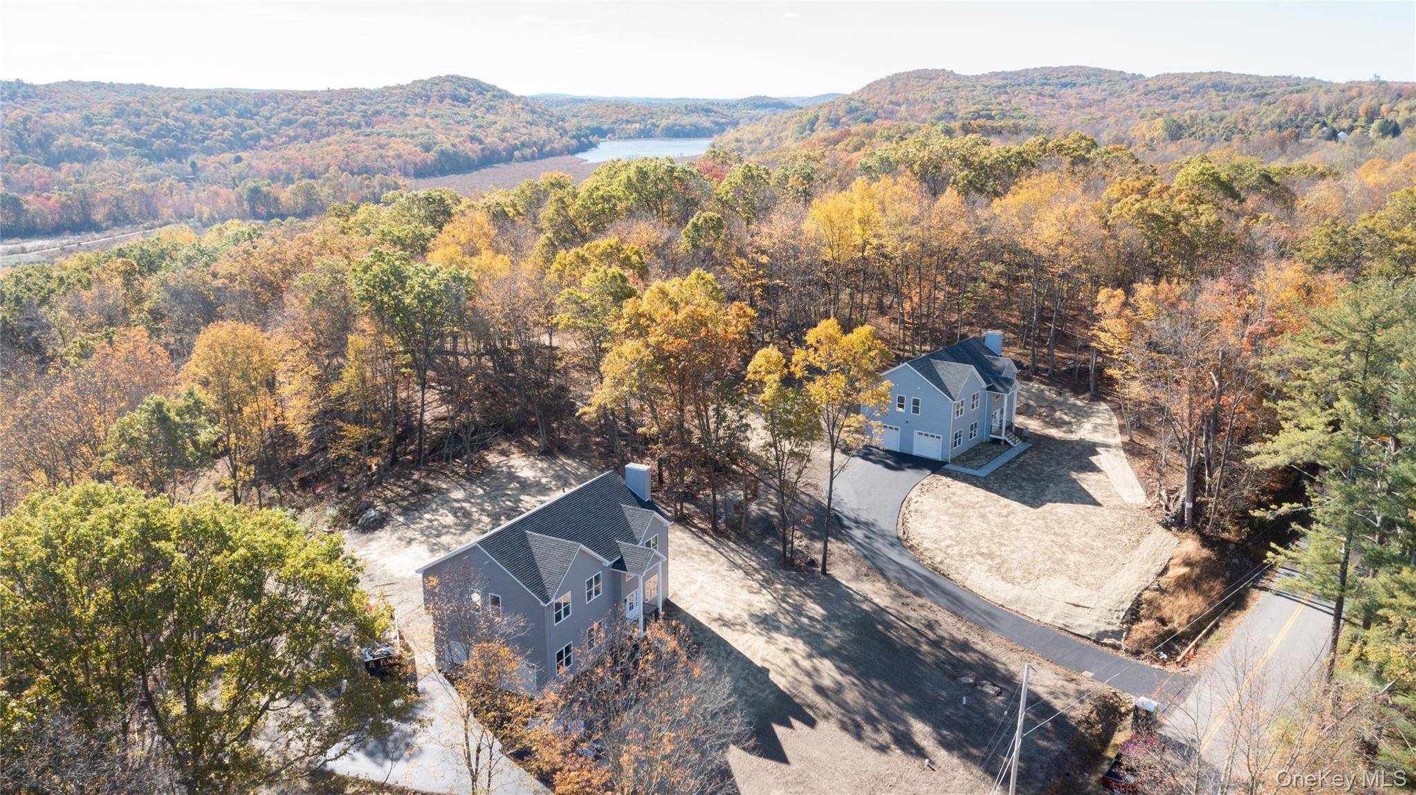 Be the first to live in this stunning NEW construction home situated on over 4 acres of land in the Carmel School District.